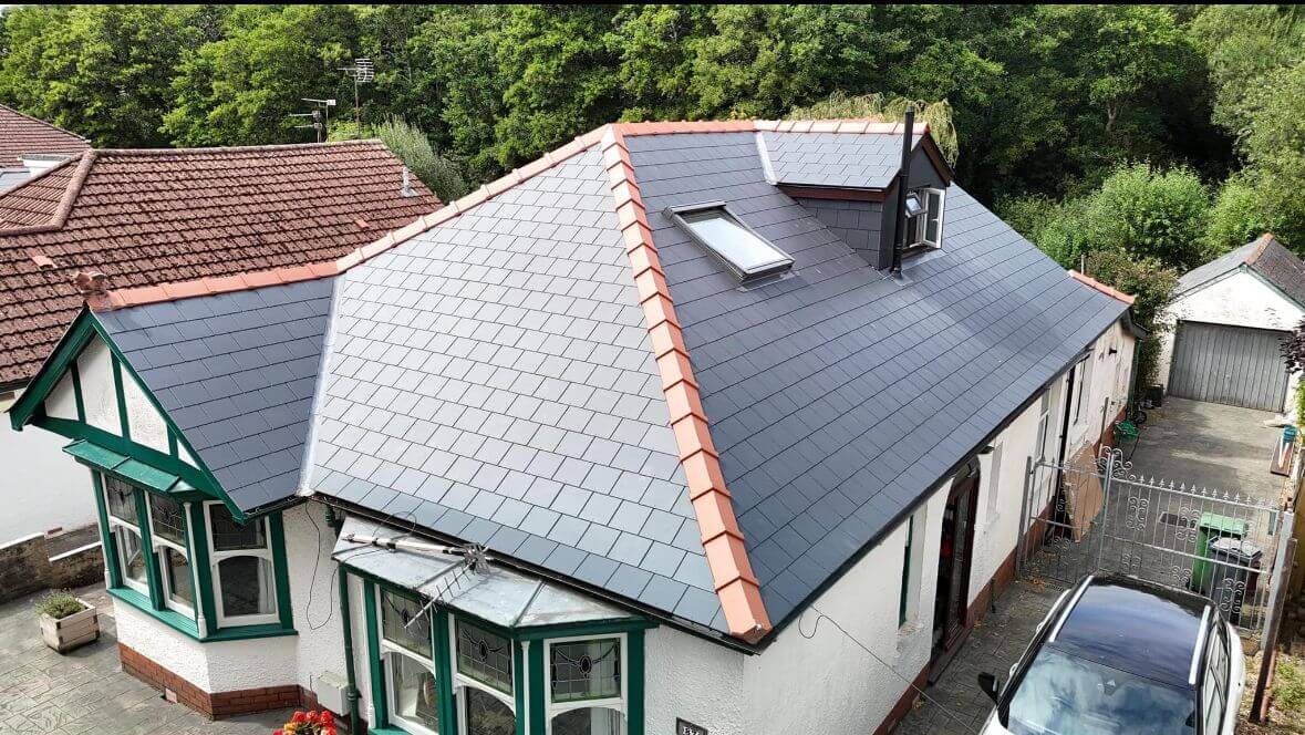 Roofers working on an old roof in Cork City